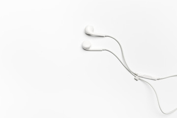 white Earphones isolated on white background