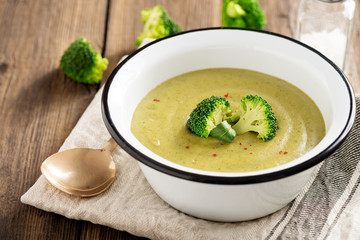 Fresh broccoli cream soup in bowl. 