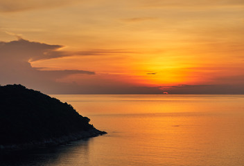  Spectacular sunset over sea lagoon and island
