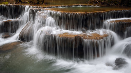 Huay mae khamin waterfall, this cascade is emerald green and popular in Kanchanaburi province, Thailand.