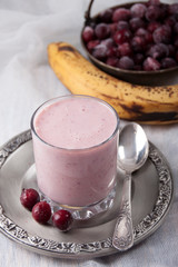 Smoothie of banana and frozen cgooseberry