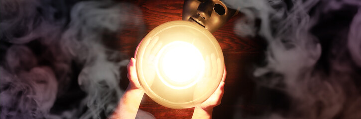 A sorcerer's table with a fortune-teller ball