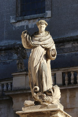 Fototapeta premium Statue of Saint Thomas Aquinas, with the hands cut off