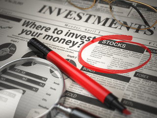 Fototapeta premium Stocks is the best option to invest. Where to Invest concept, Investmets newspaper with loupe and marker.
