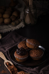 Homemade chocolate muffins with chocolate topping