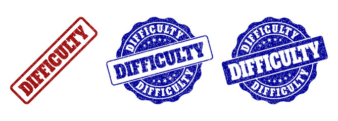 Fototapeta premium DIFFICULTY grunge stamp seals in red and blue colors. Vector DIFFICULTY signs with grunge texture. Graphic elements are rounded rectangles, rosettes, circles and text labels.