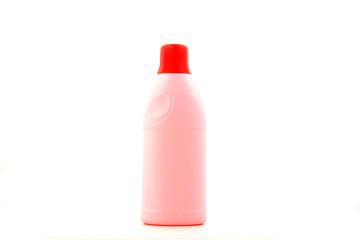 red plastic bottles in white background