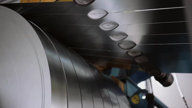 Slitting roll of steel in factory