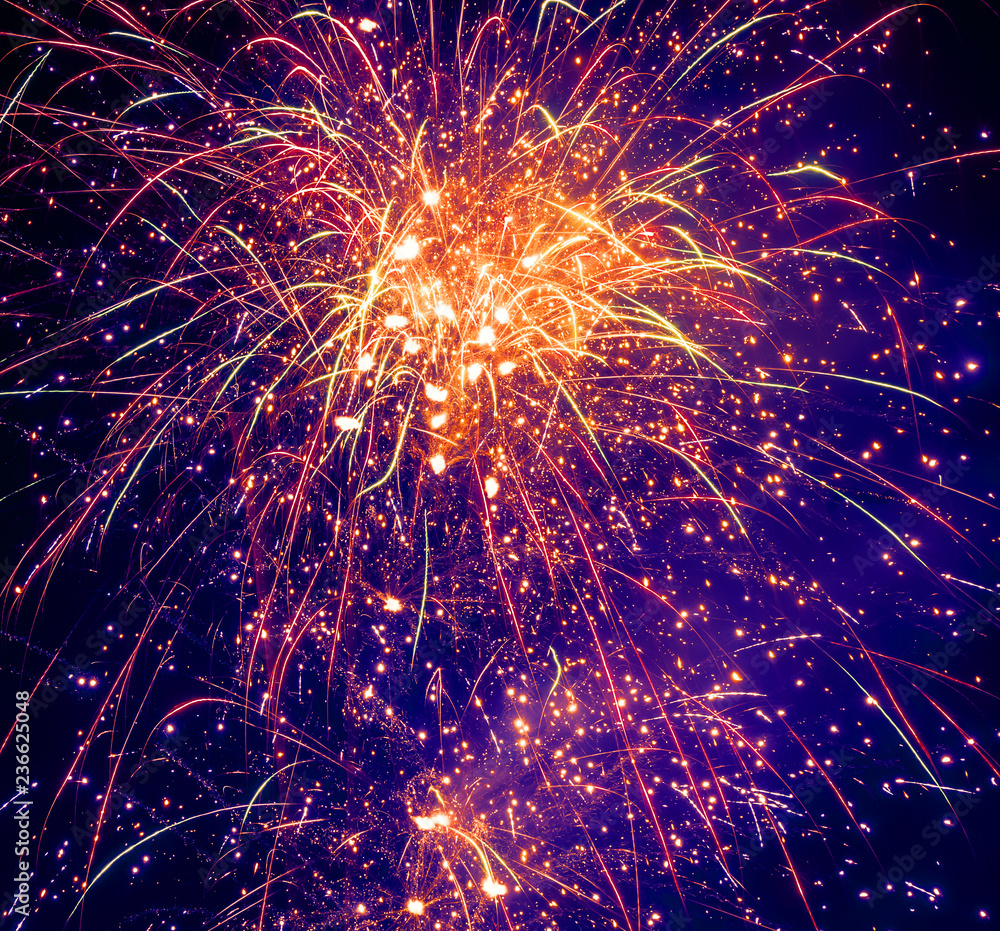 Poster brightly colorful fireworks on twilight background with copoy space