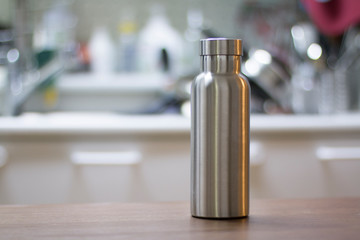 Insulated Stainless Bottle with sink kitchen background
