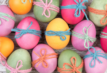 Easter eggs, frame, white wooden background, top view, copyspace