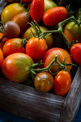 Fresh Heirloom tomatoes in crate