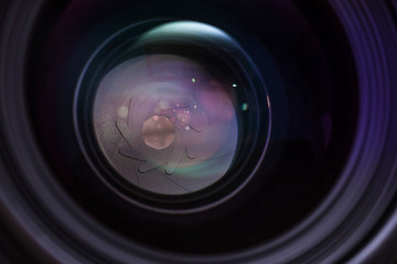 Set of various DSLR lenses with colorful reflections
