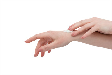 Сloseup of female hands applying hand cream. Spa. Anti-aging Treatments for skin. Daily practice for health. Natural and organic products, non-animal cosmetics.