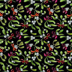 Seamless pattern, background with the branches of mistletoe and red bows.