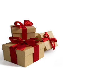 Gift boxes wrapped in red ribbon bow. Isolated.