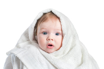 Cute surprised Baby in fluffy towel after bathing isolated on white background. Concept of hygiene, childcare