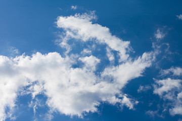 White fluffy clouds in the blue sky