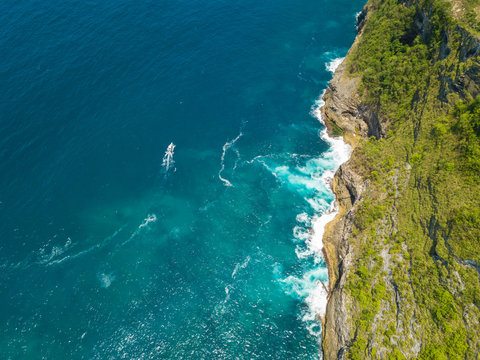Aerial view of the ocean cliff near Kelingking beach located on the island of Nusa Penida, Indonesia