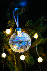 transparent glass ball on Christmas tree