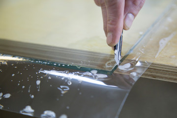installation of protective film on the window