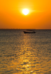 Fototapeta na wymiar Sunset on ocean in Zanzibar