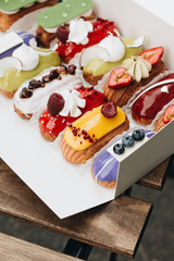 Set of delicious sweets with glaze, colorful dessert