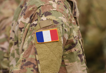 Flag of France on soldiers arm (collage).