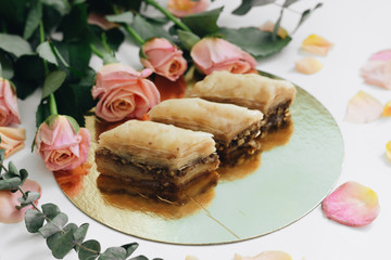 Baklava sweet dessert. Pastry made of layers of filo filled with chopped nuts and sweetened and held together with syrup or honey