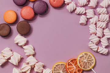 lot of candies on pink background, birthday celebration 