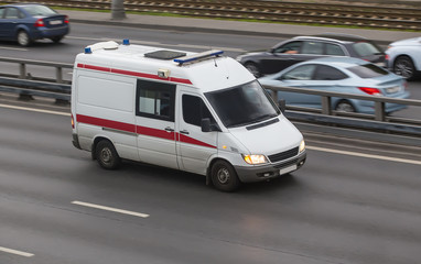 emergency medical service goes on the city street