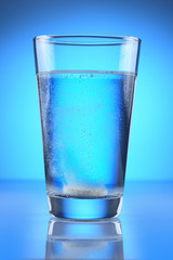 Effervescent tablet in glass of water