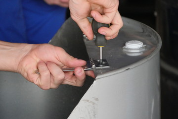 working with a screwdriver