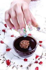 a woman's nail, designed with nail art