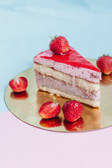Two pieces of delicious cake with strawberries, sweet dessert