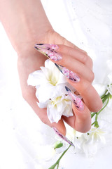 Fototapeta na wymiar a woman's nail, designed with nail art