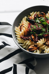 Delicious pasta with tomatoes, mussels and herbs