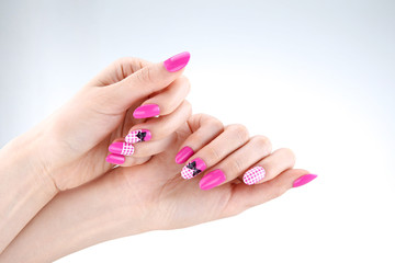 a woman's nail, designed with nail art