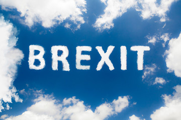 Naklejka na ściany i meble Word brexit on blue sky inside cloud form frame, financial concept.