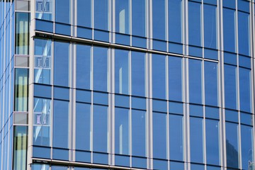 View of modern glass skyscraper,exterior of glass wall with abstract texture