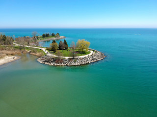 Great view at the lake Ontario from the cliff park aerial. Sunny day green crystal calm water....