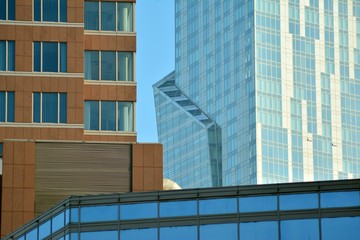 Obraz premium View of modern glass skyscraper,exterior of glass wall with abstract texture