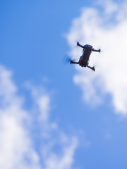 Fototapeta na wymiar Drone flying over sky background