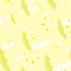 Pattern of cute leaves and petals of garden plants in yellow tones.