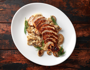 Grilled slices Chicken Breast with Creamy Mushroom Sauce. healthy food