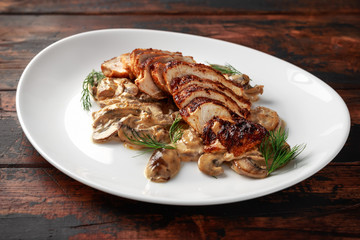 Grilled slices Chicken Breast with Creamy Mushroom Sauce. healthy food