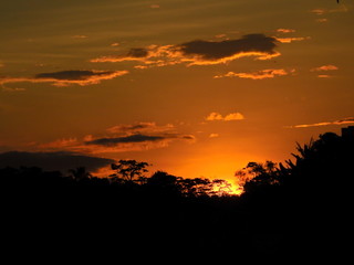 sunset, sky, clouds, sun, orange, nature, sunrise, landscape, cloud, evening, red, dusk, sundown, beautiful, color, blue, yellow, beauty, night, silhouette, colorful, cloudy, trees, light, dramatic
