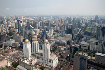 Naklejka na ściany i meble BANKGKOK, THAILAND - MAY 10 2018: Aerial view on the city from Bayok Sky hotel in sunny day