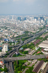 Fototapeta na wymiar Aerial view on modern buildings and highway road