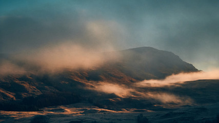 fog over mountains at sunrise